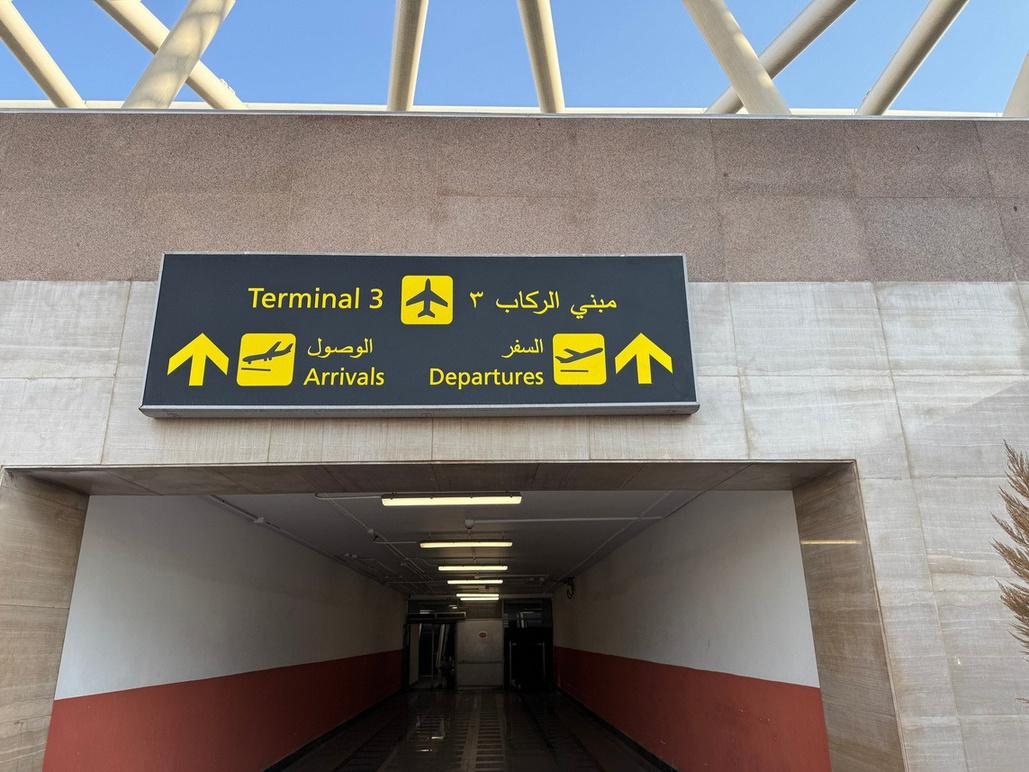 Terminal 3 arrivals and departures signage at Cairo International Airport